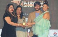 PRO Naghma Khan was honored with the Mid Day Showbiz Award at the hands of Vivek Oberoi and Daisy Shah, in Dubai.